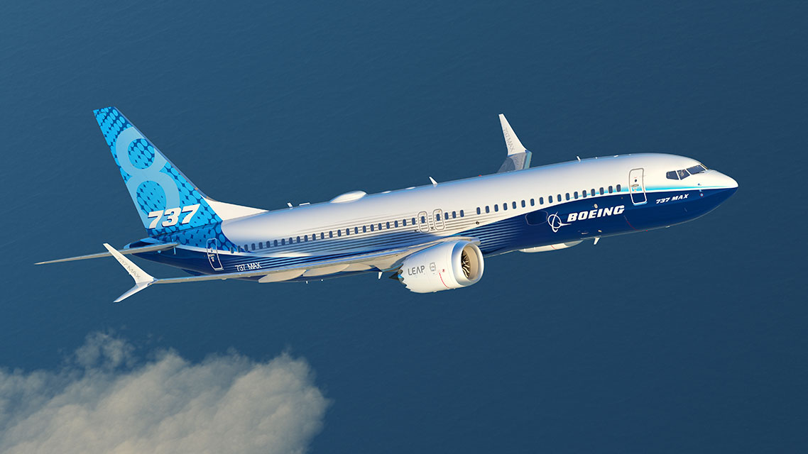 A blue and white Boeing 737 Max in flight against a blue sky